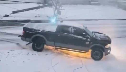 Friendly Reminder For People Dealing With Snowstorms – DO NOT Drive Your Car Over Fallen Power Lines