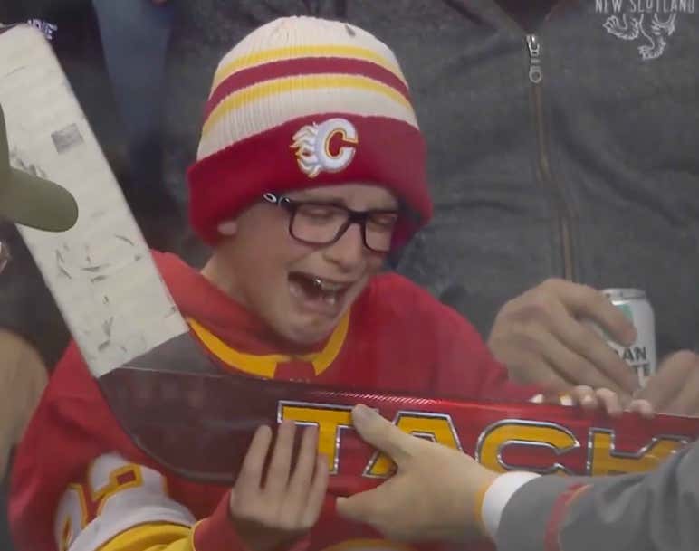 Some Things Are Bigger Than Sports: Young Fan Brought To Tears When He Receives A Stick From Dustin Wolf
