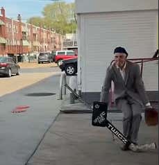 Playoff Hockey Is Back In Philly, And Now We Have Dudes Hopping In Net While Wearing A Suit And Ripping Darts