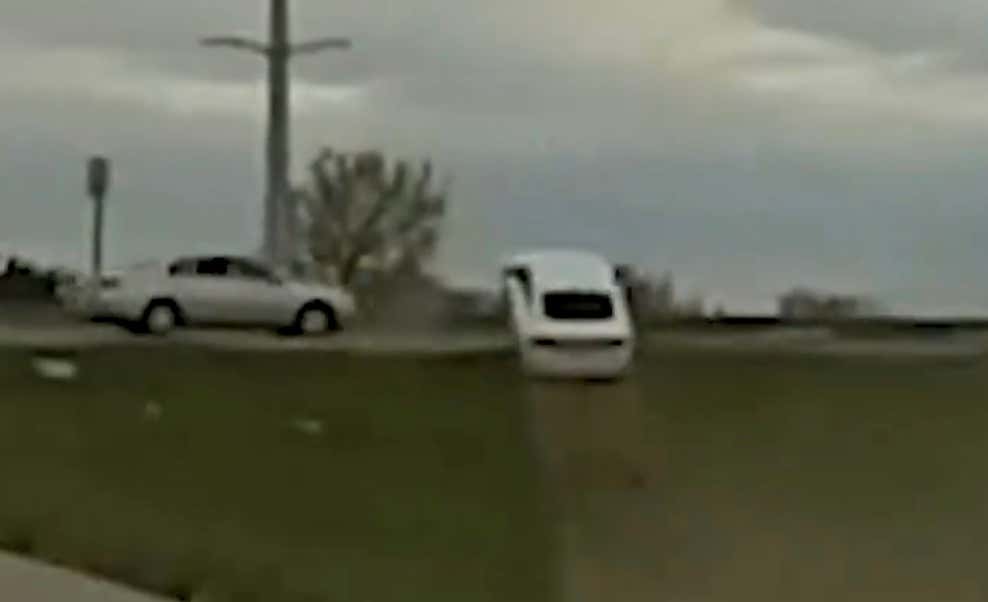 Holy Shit – Watch This Car Go Full Dukes of Hazzard and Ramp Another Car Mid-Police Chase