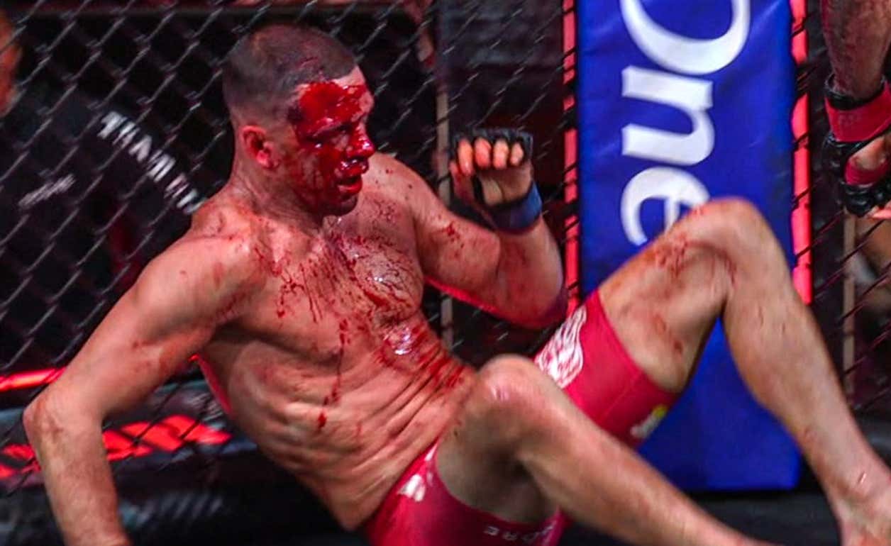 Mike Perry Beat The Hell Out Of Nate Diaz And Gave Him One Of The Most Insane Crimson Masks Ever