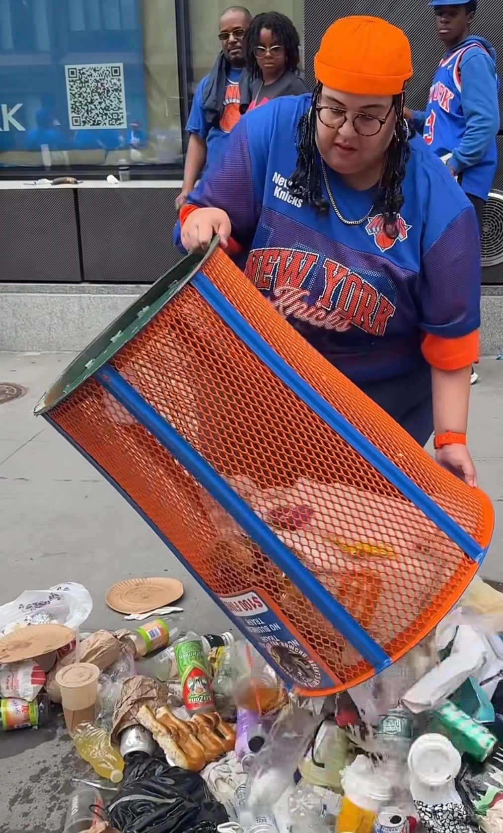 As Expected, Knicks Fans Were Stealing The Signature Blue and Orange Garbage Can During The Parade Yesterday