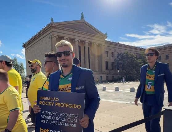 Brazil Fans Aren't Taking Any Chances With The "Rocky Curse" In Philly, Bring Security With Them To Make Sure Nobody Puts Brazil Jersey On Rocky Statue