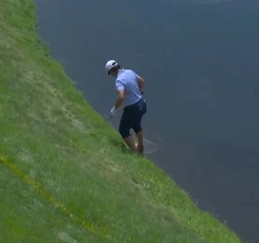 Golf Shot of The Tournament (Probably) – It's Not Often You See A Golfer Remove Their Socks and Shoes, Stand Ankle Deep in Water, and Hole a Golf Shot