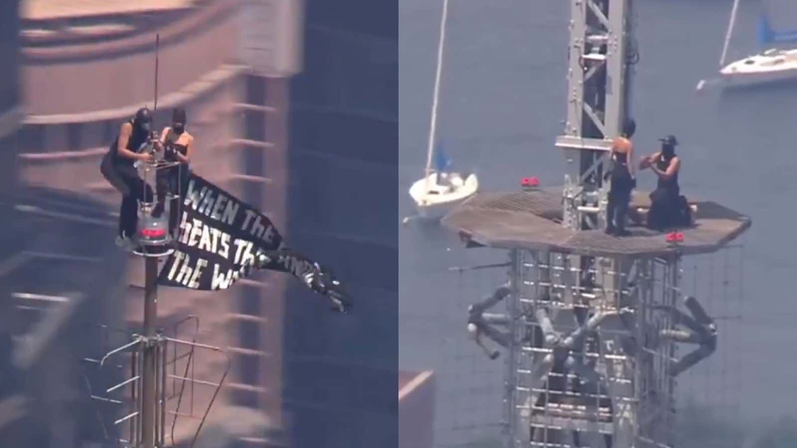 A Masked Couple Climbed To The Top Of The Empire State Building Antenna, Hung A Peace Sign, Then Got Engaged