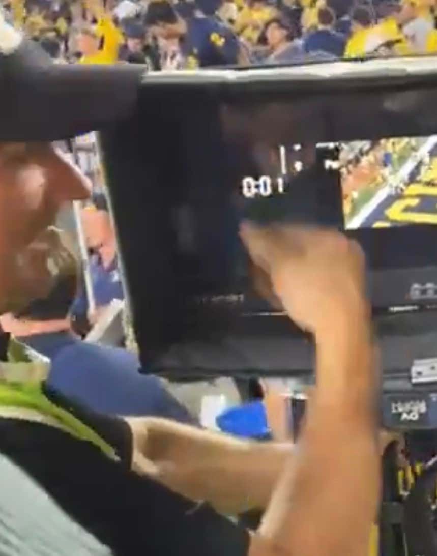 A Big Ten Replay Worker Showing Fans There Was 1 Second Left On The Clock For Michigan’s Hail Mary Is Peak College Football Madness