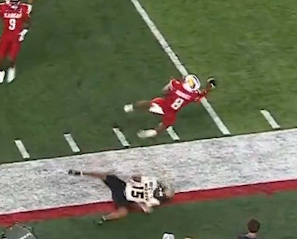 Kansas' Quarterback Isaiah Marshall Completed One of The Most Absurd Throws You'll Ever See
