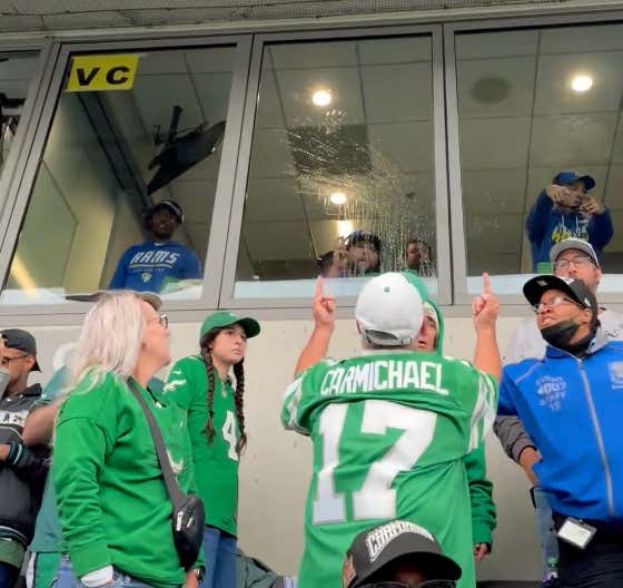 A Group Of Enthusiastic Eagles Fans Attempted To Share Their Drinks With The Rams Coaching Staff By Throwing Them Towards The Coaches