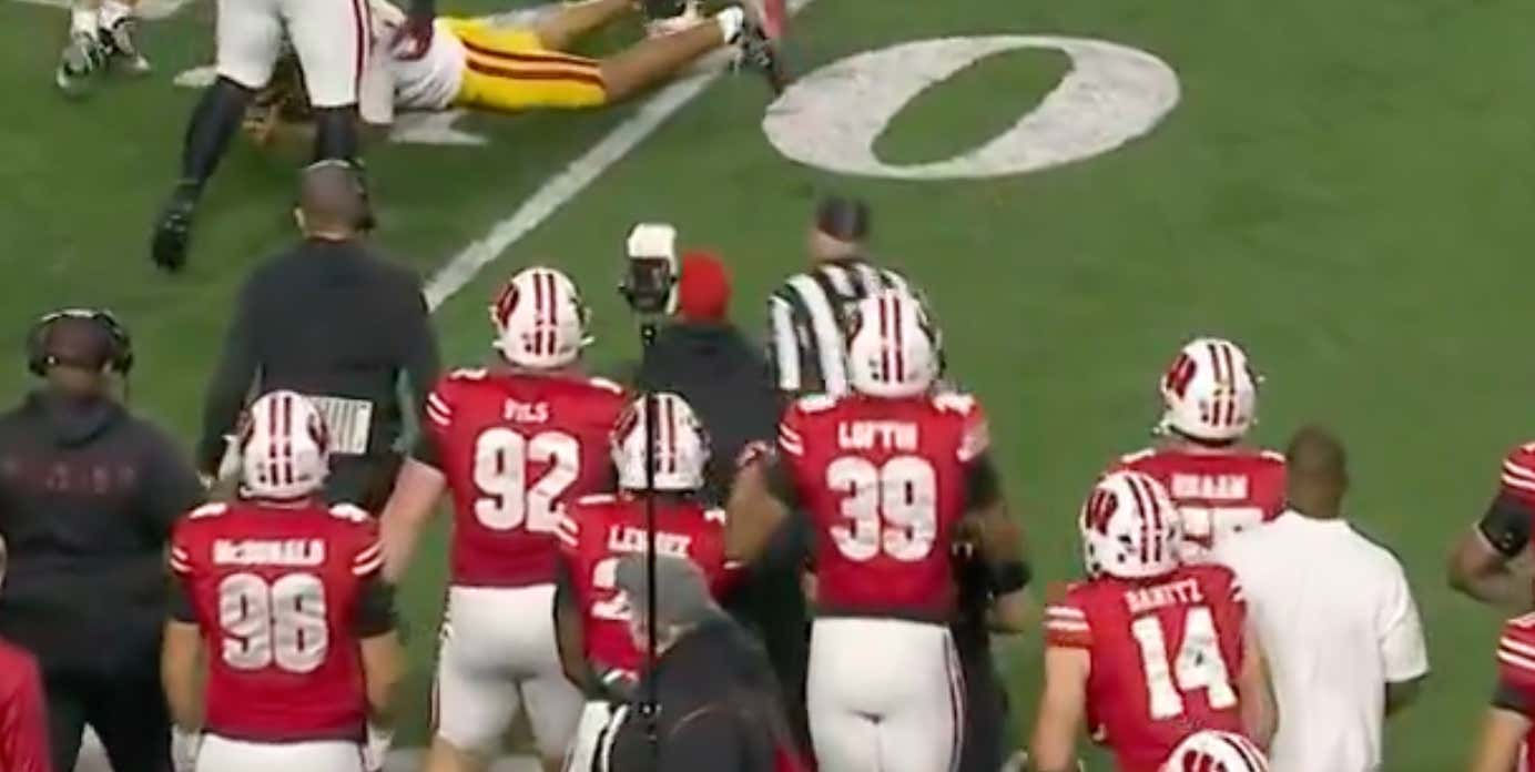 The Softest Ref on the Planet Threw a Flag After He Ran Straight Into a Wisconsin Coach