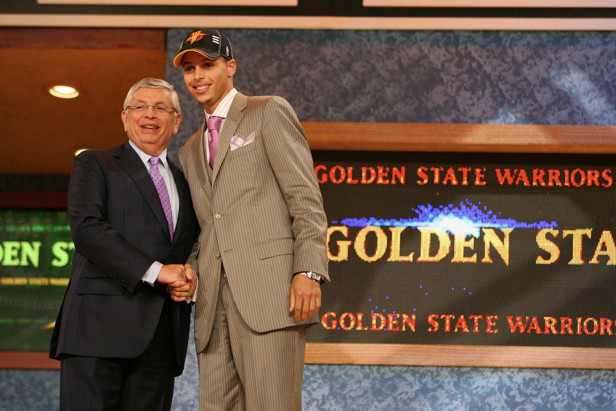 NEW YORK - JUNE 25:  Stephen Curry shakes hands with NBA Commissioner David Stern after being selected seventh by the Golden State Warriors during the 2009 NBA Draft on June 25, 2009 at the WaMu Theatre at Madison Square Garden in New York City. NOTE TO USER: User expressly acknowledges and agrees that, by downloading and/or using this Photograph, user is consenting to the terms and conditions of the Getty Images License Agreement. Mandatory Copyright Notice: Copyright 2009 NBAE (Photo by Nathaniel S. Butler/NBAE via Getty Images)