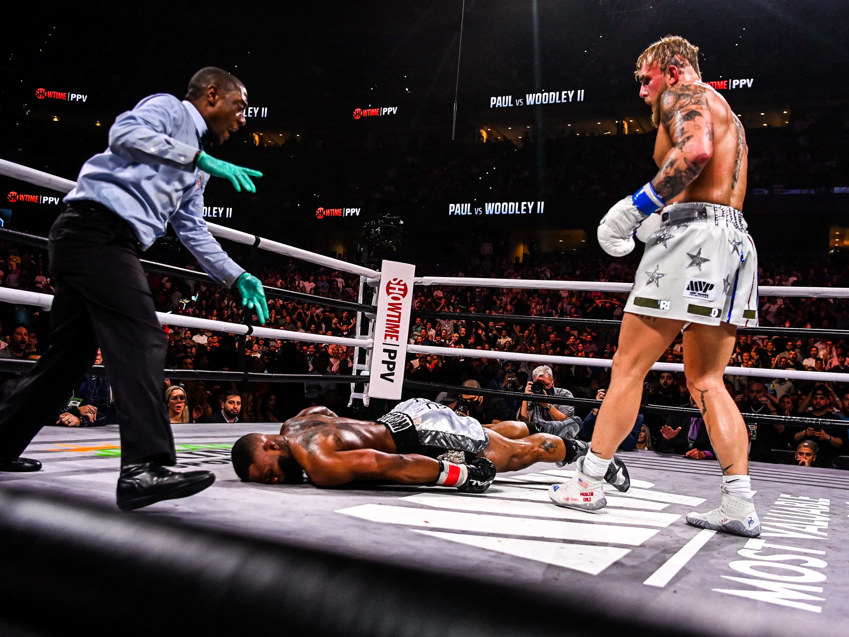 Jake Paul shows off custom-made £350k 'Most Valuable Boxer' belt featuring  Rolex watch ahead of Tyron Woodley rematch