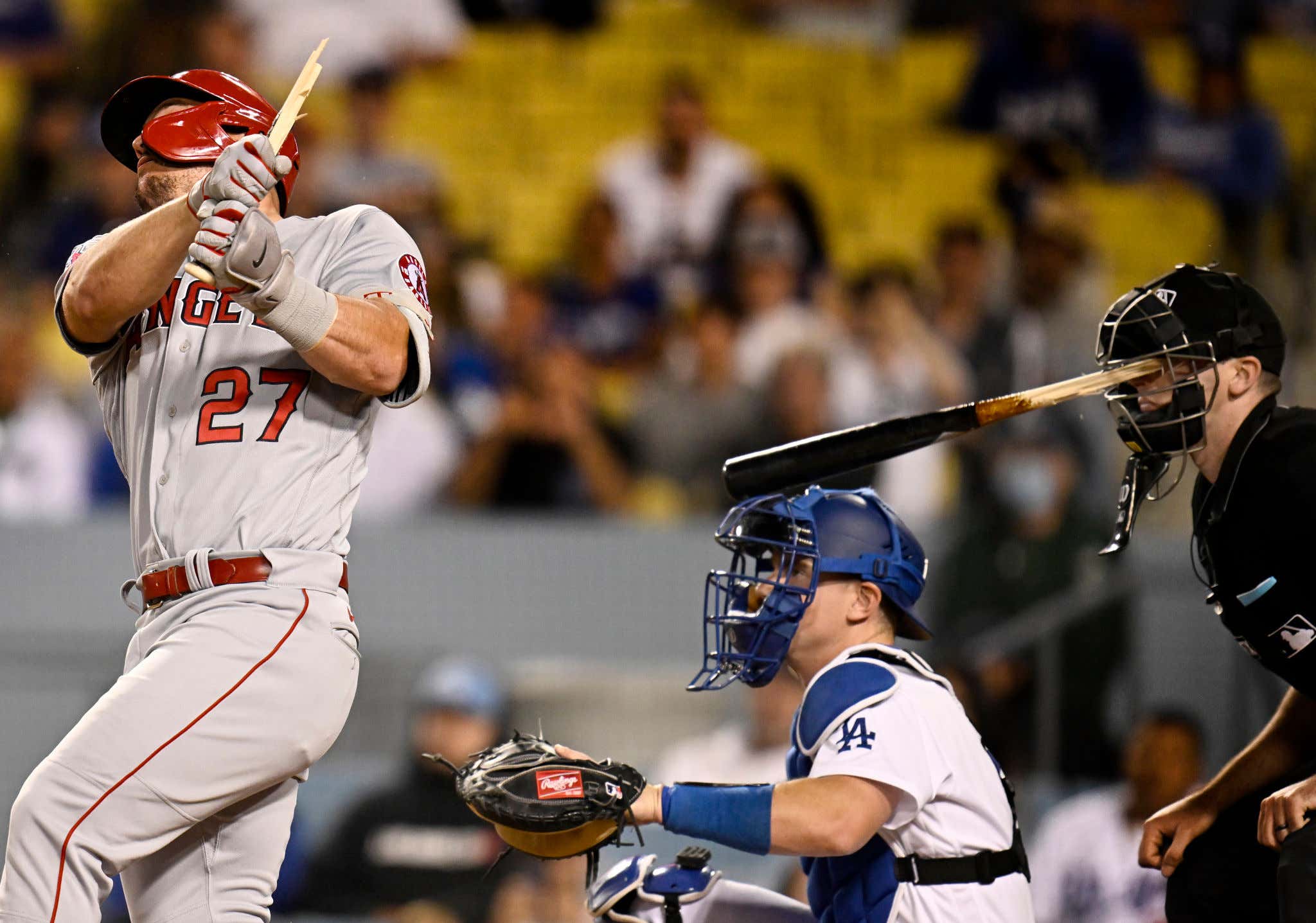 Scary Moment In The Angels Game Last Night After Mike Trout's Bat Breaks And Goes THROUGH The Umpire's Mask And Hits Him In The Face