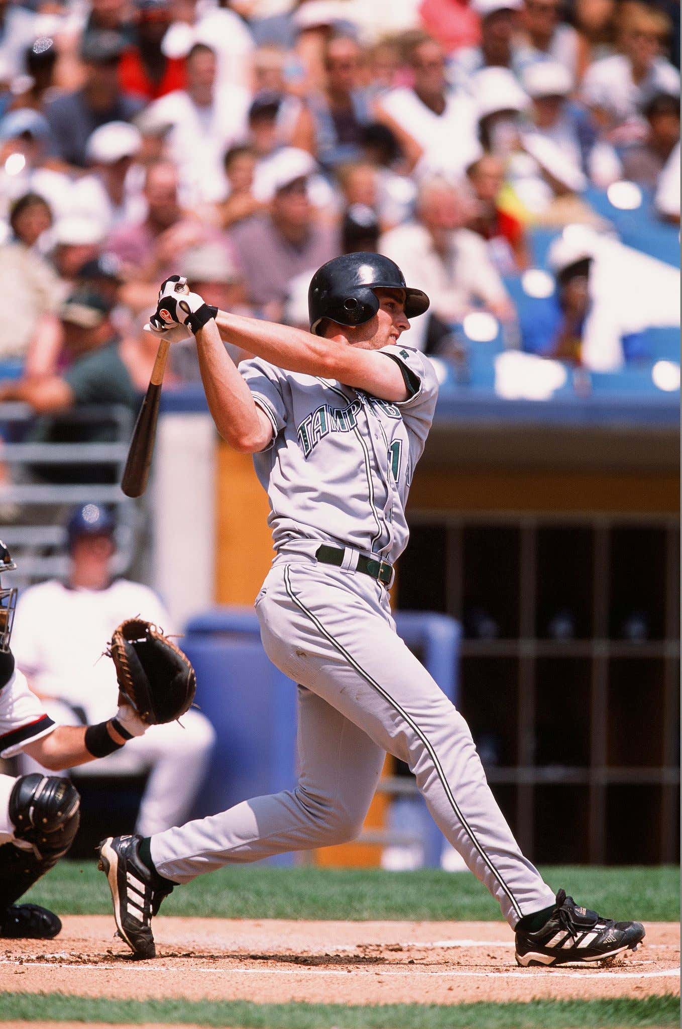 New York Yankees' Chuck Knoblauch is safe on bad throw from Ken News  Photo - Getty Images