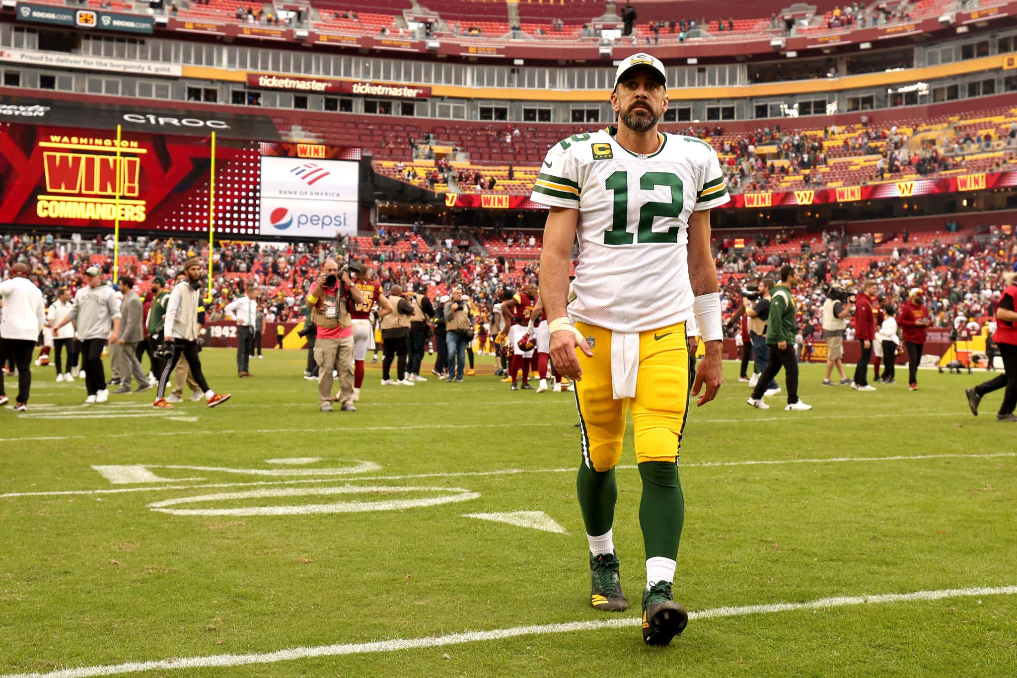 Aaron Rodgers Feted by Fans During Rangers' Playoff Game at