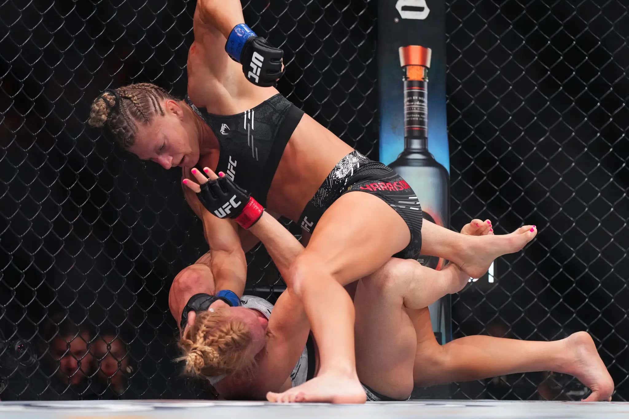 Kayla Harrison STEAMROLLS Holly Holm In Her UFC Debut