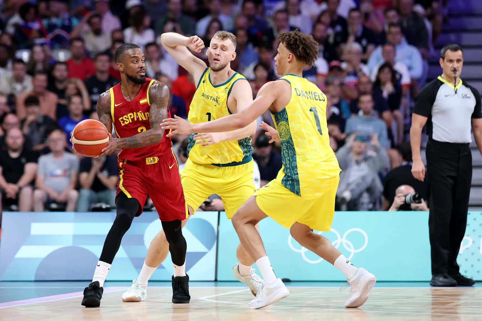 Motivation 101: Australia's Basketball Coach Fired His Team Up For The Olympics By Showing Them A Video Of All The Times They Lost To Spain