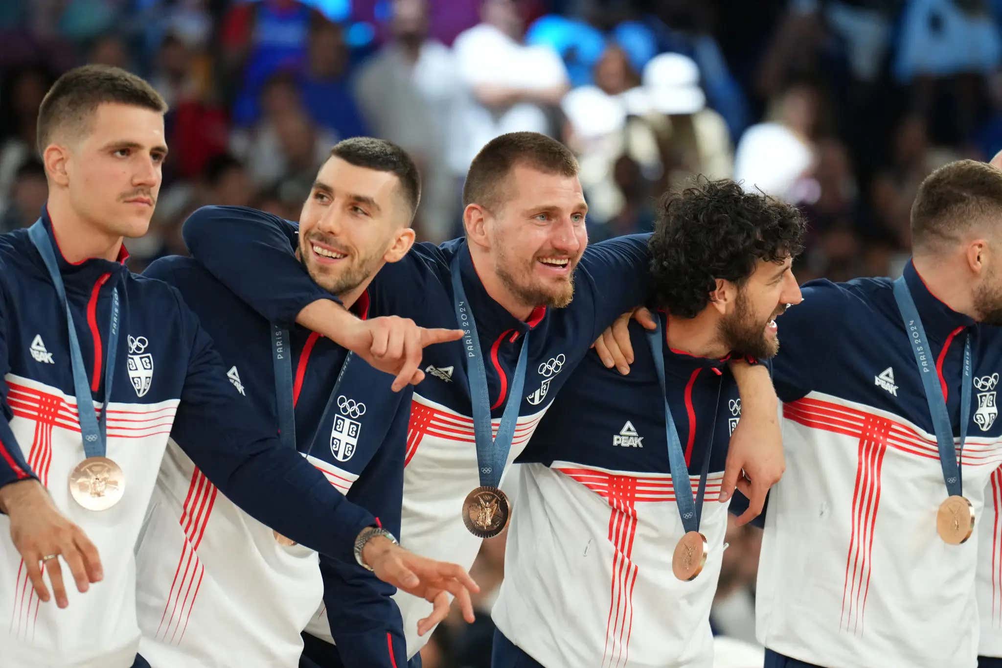 Nothing Embodies The Olympic Spirit Like This Video Showing Nikola Jokic Getting More And More Shitfaced Before Receiving His Bronze Medal