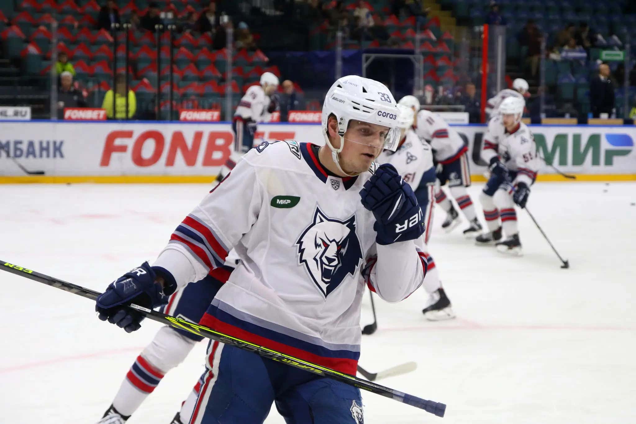 Wait Until You Get A Load Of The Haircut On This New Coach In The KHL. Pure Sex