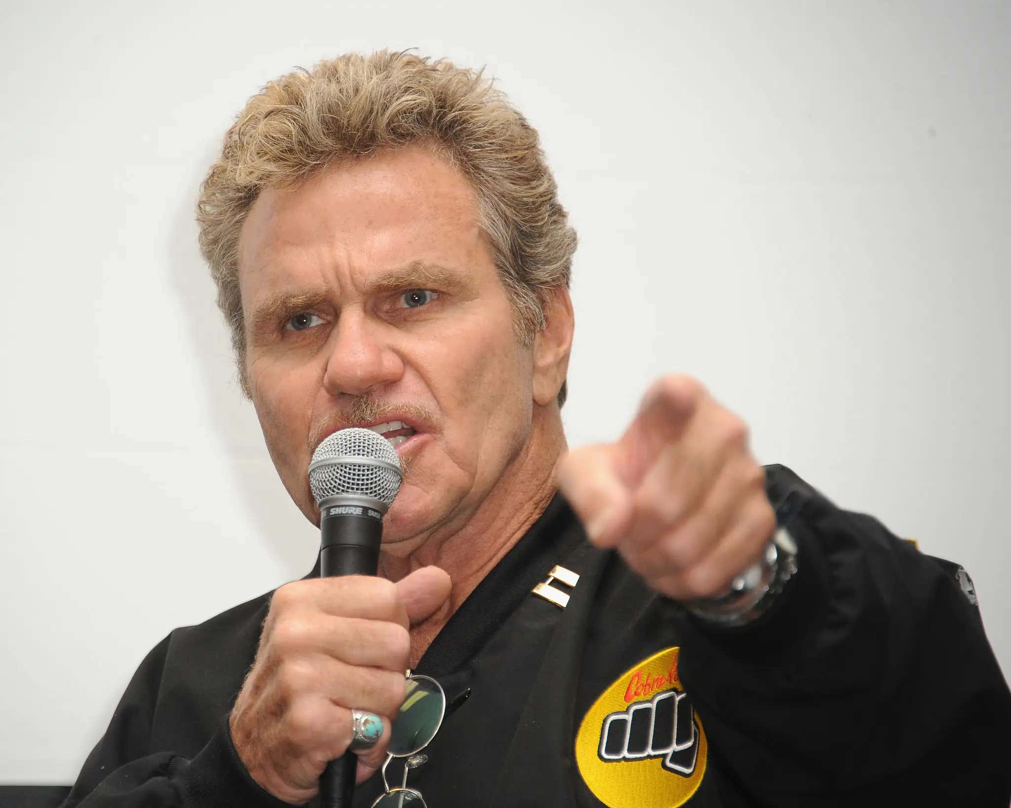 The Villain of 'The Karate Kid' is Accused of Going Full John Kreese on His 'Cobra Kai' Co-Star, and Biting Her on the Arm at a ComicCon