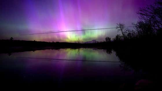 The Northern Lights AKA Aurora Borealis Was Ripping Across The Night Sky In Chicago Last Night. No Big Deal