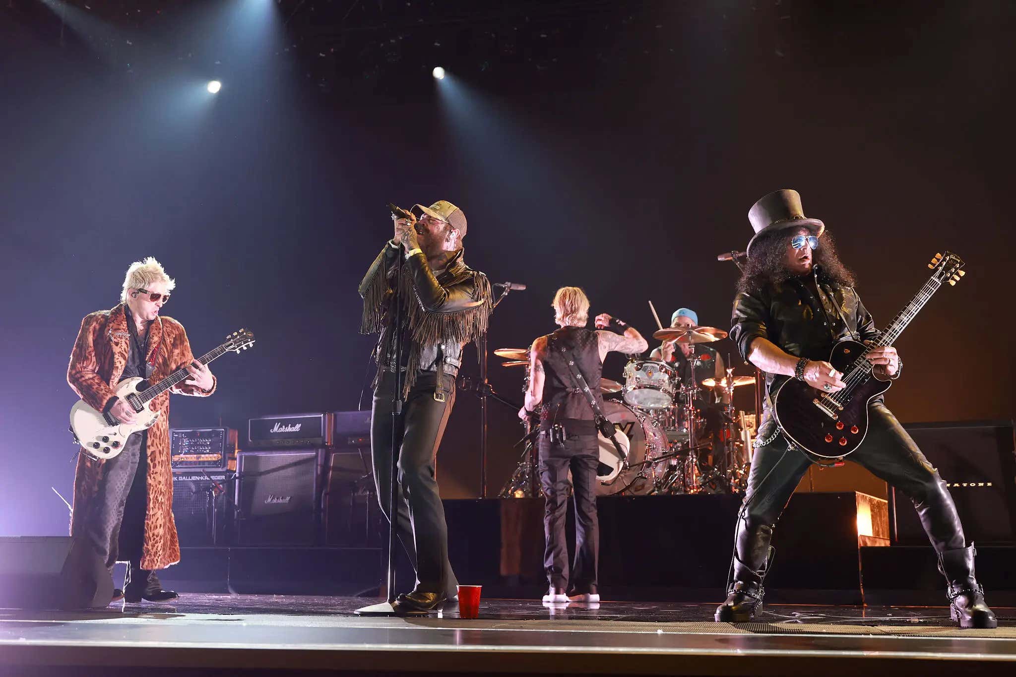 Post Malone, Slash, Andrew Watt, Chad Smith, And Duff Smashed A Tribute Cover Of Black Sabbath's "War Pigs" At Last Night's Grammy Awards, Olivia Dean Took Home "Best New Artist", And Bad Bunny Took Home The Night's Top Honor For Album Of The Year