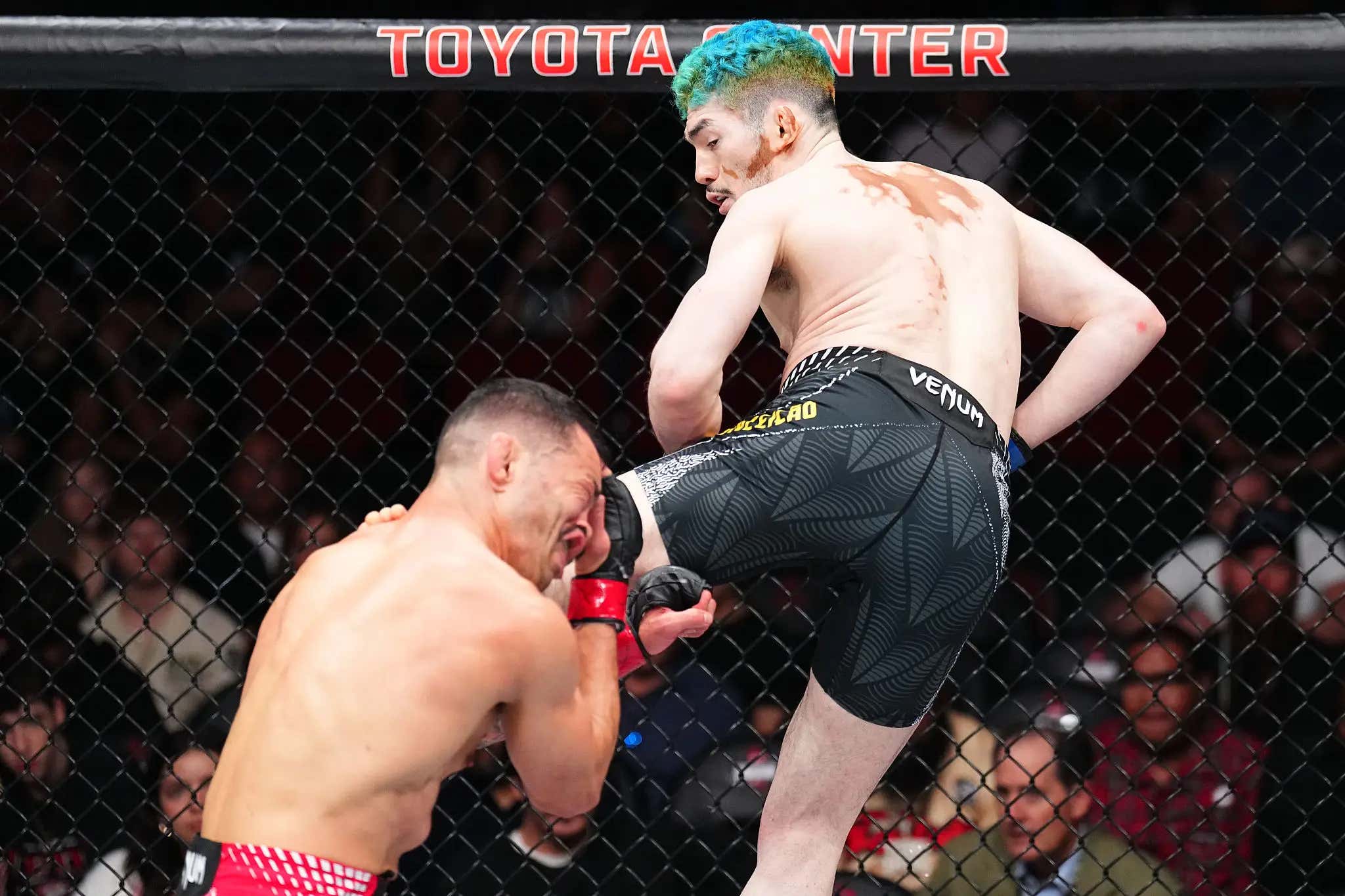 Melquizael Costa Just Spinning Back Kicked His Way Into Becoming The First Person To EVER Finish Dan Ige (And Then Launched His Cup Into The Crowd)