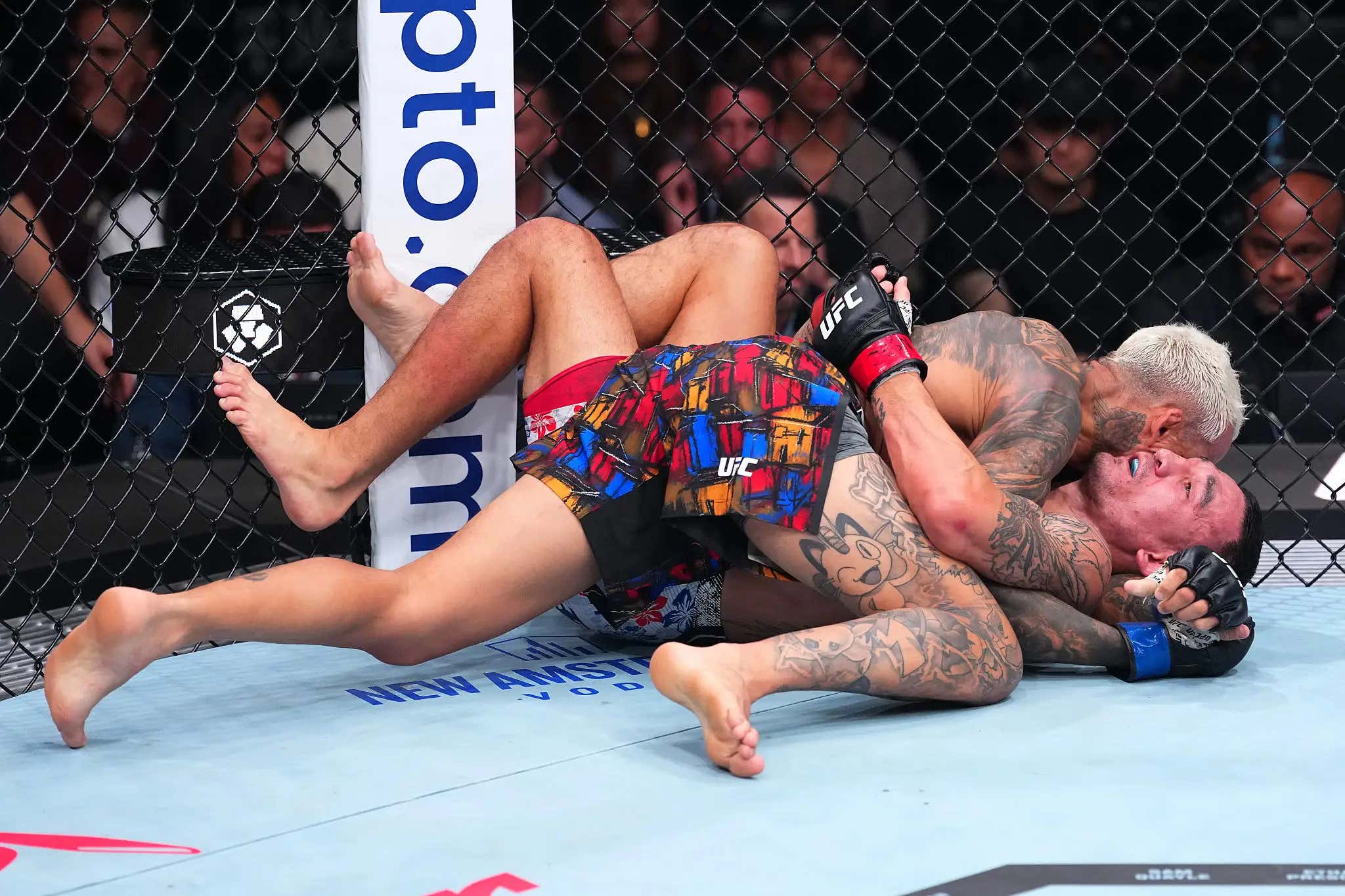 Charles Oliveira Dominates Max Holloway In The Worst BMF Title Fight Ever