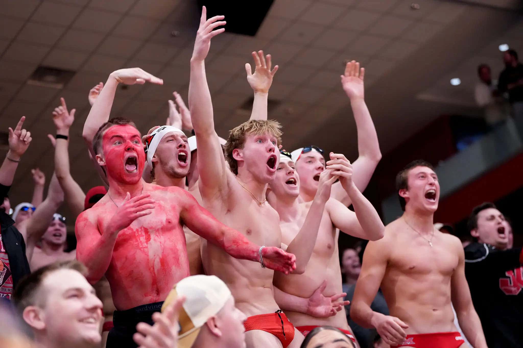 There's No Higher Form Of School Spirit Than The Miami (Ohio) Swim Team Going Full Sack Attack In Their Speedos At The Basketball Games