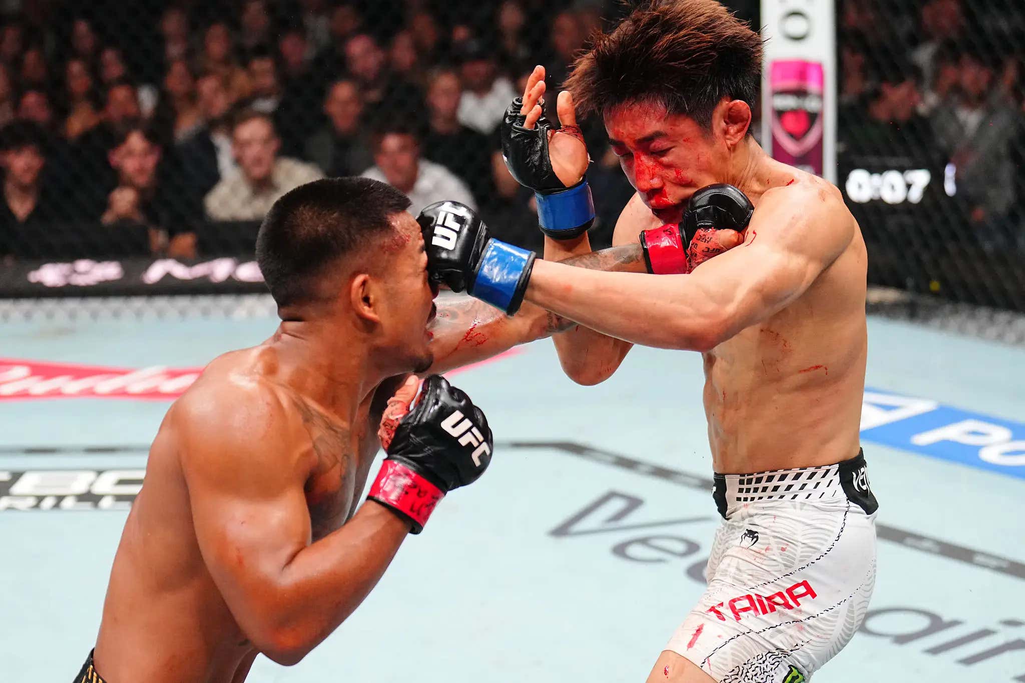Joshua Van TKOs Tatsuro Taira In One Of The Greatest Flyweight Title Fights Of All Time