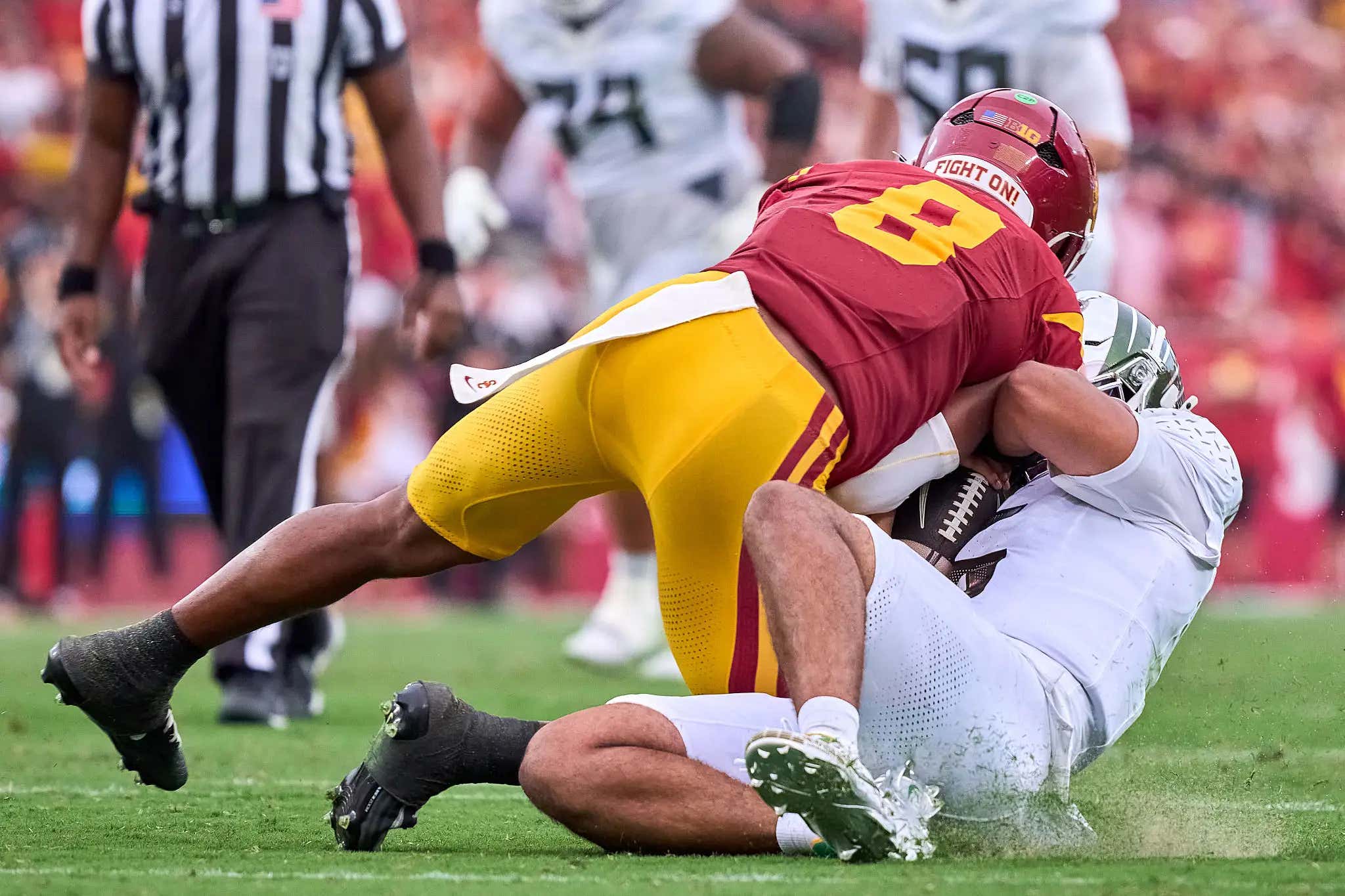 Dante Moore Is The Latest Victim Of The Most Obviously Stupid Allowable Act In Team Sports - The Quarterback Slide
