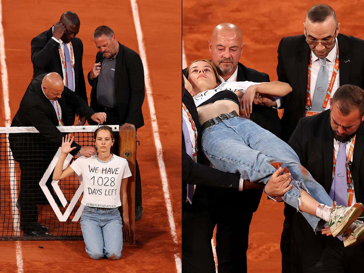 Wild Moment At The French Open As A Protester Invaded The Court And Tied Herself To The Net While Wearing a Shirt That Says We Have "1,028 Days Left"