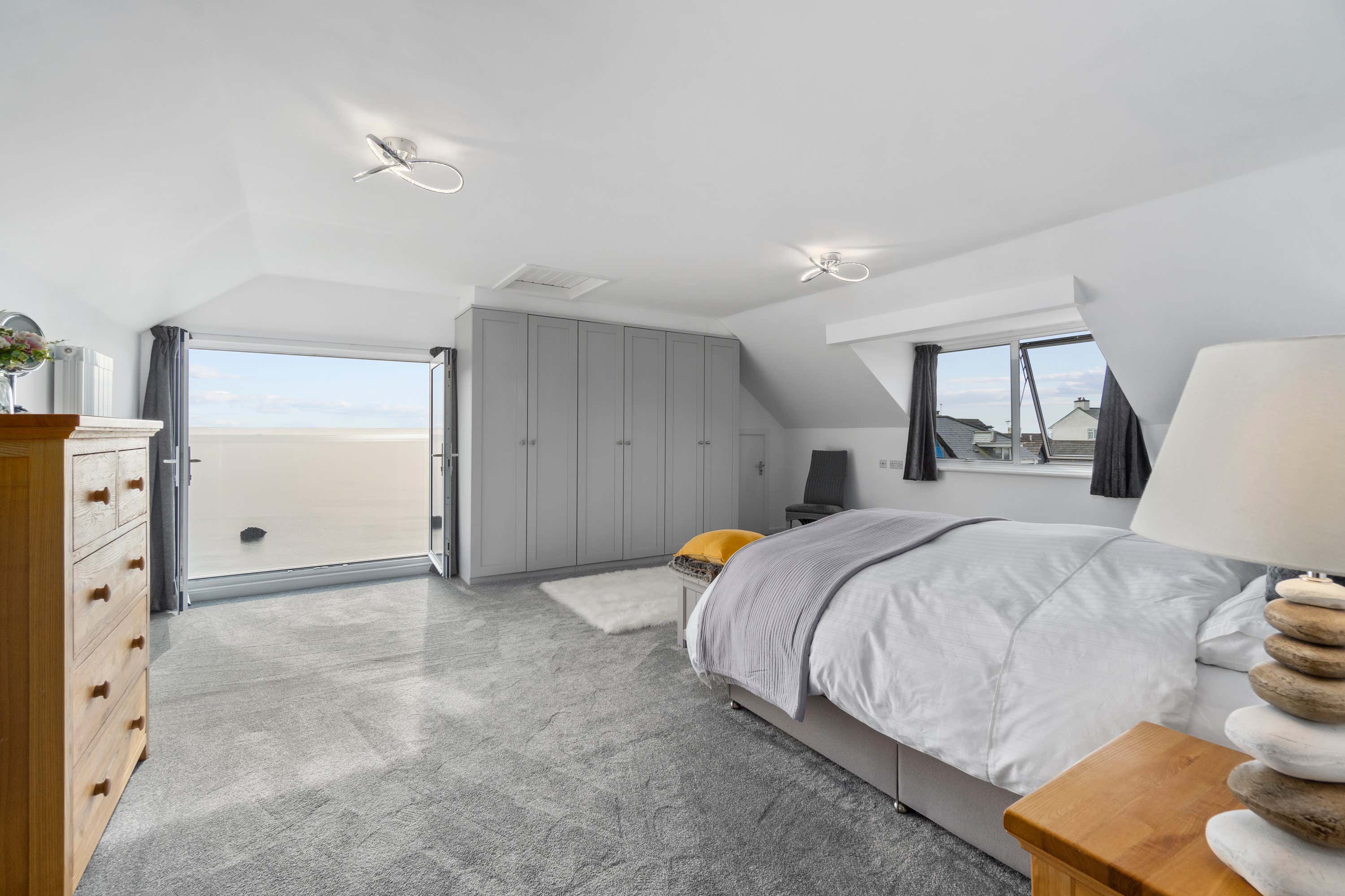 Beach House Bedrooms Are Decorated Very Boring… I Found A Way To Fix That Involving Sports