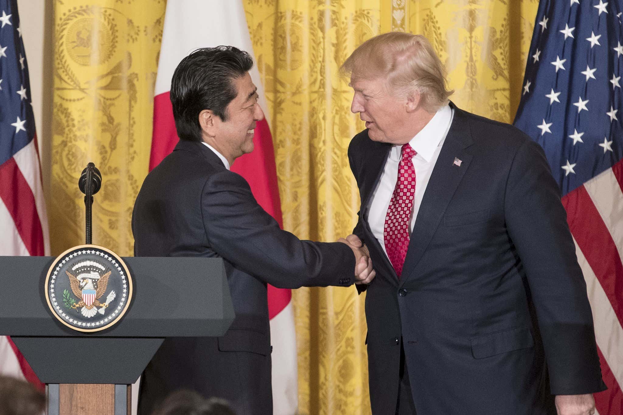 The First Ever Trump, Putin Handshake Is In; Let's Break It Down