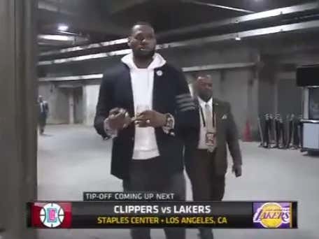 Is Lebron Walking Into the Staples Center Drinking Wine Before An NBA Game A Desperate Cry For Help?