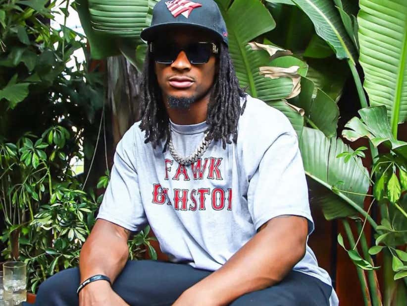 Todd Gurley Who Quit On His Team and Country When He Fell Down On Purpose Rather Than Scoring A TD And Who Rushed for 35 Yards on 10 Carries in the Super Bowl Wears A Fuck Bawston Tshirt