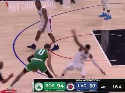 Tatum hits this huge three to push the game to OT and keep the over a live. The total is 217.